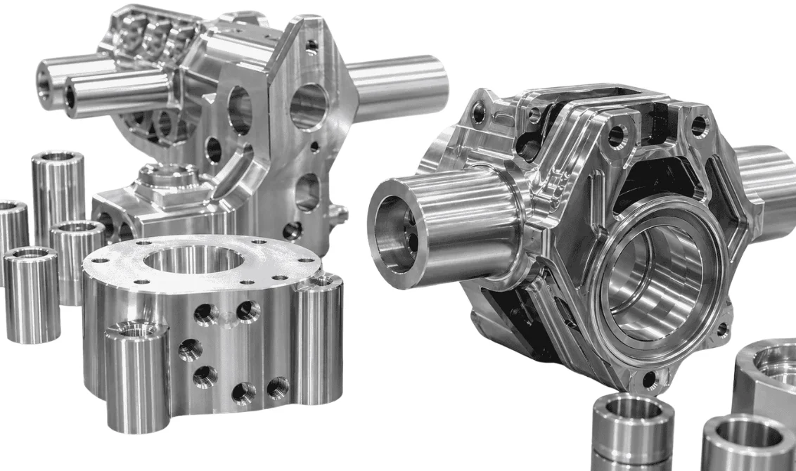 Collection of precision investment-cast robotic components including housings, joints, and structural parts for industrial robot assemblies.