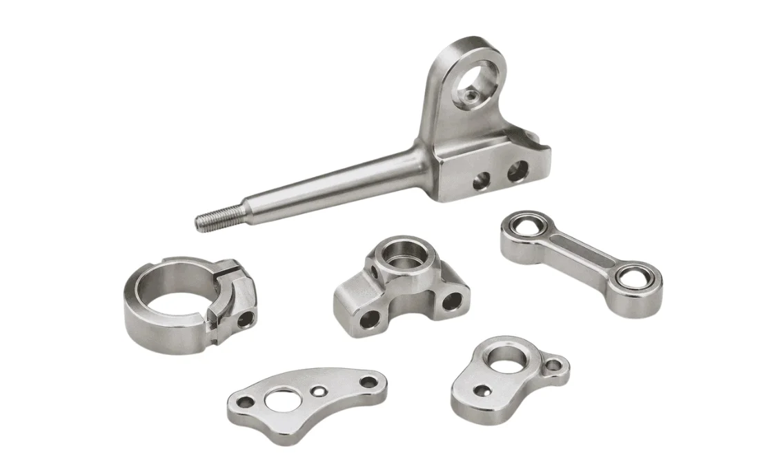 Precision investment-cast actuator housing and mounting bracket components showing integrated internal geometry and bearing surfaces.